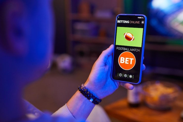 Permainan Andar Bahar live dealer di hujantogel dengan kartu pembuka dan layout meja